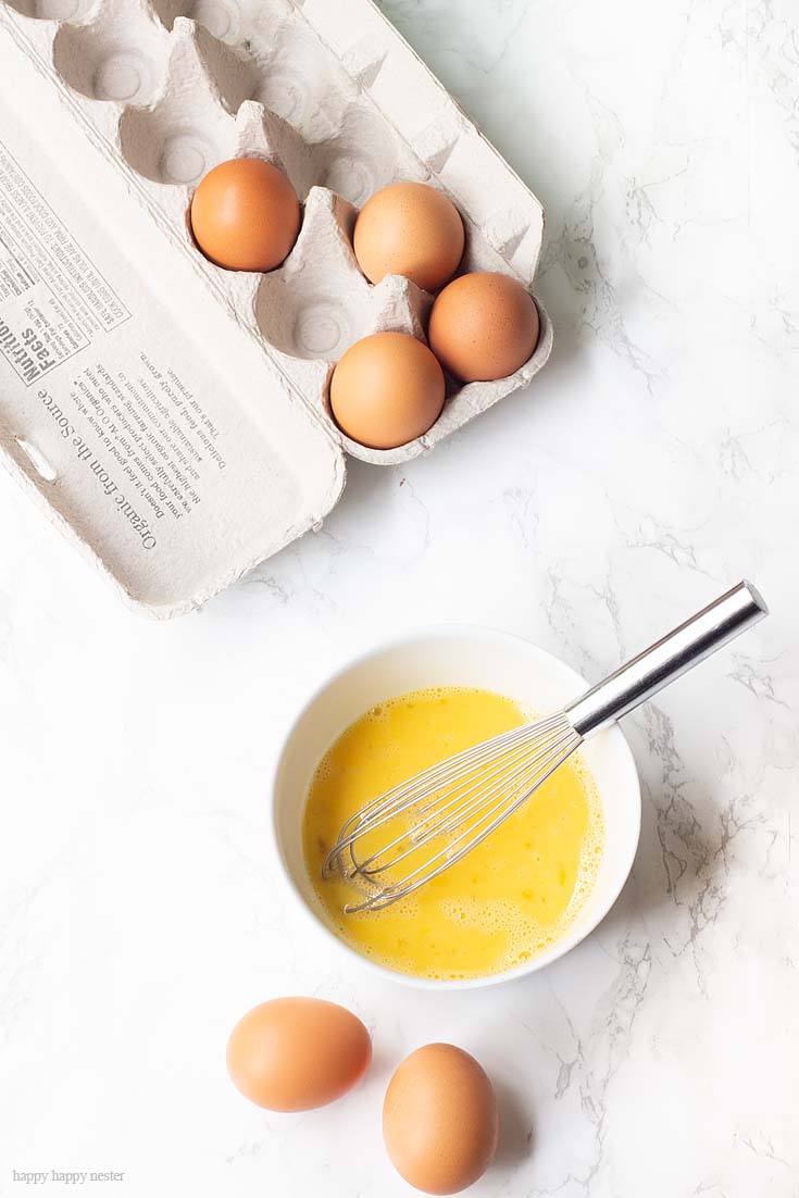 Eggs and Butter Make This Creamy Lemon Curd. This wonderful lemon curd recipe is from an old English Cookbook. It is such a refreshing lemon recipe that you'll want to add it to all your toasts, crepes, and scones! Fresh lemon zest and juice is the perfect combination for a wonderful recipe. #lemon #lemonrecipe #lemondessert #dessert #baking #recipes