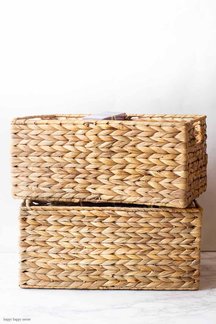 I love these water hyacinth baskets for organizing. Use baskets, clear containers, and stacking boxes to get your kitchen in order. #organizing #kitchen