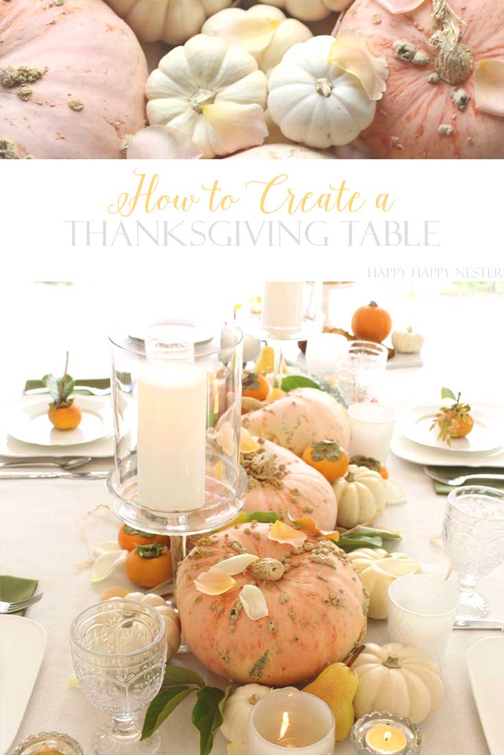 pink and white pumpkins on a decorated thanksgiving table