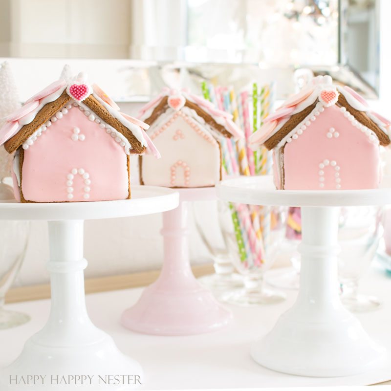 Need some gingerbread house ideas? This fun Valentine's Day Craft is so adorable. Make one or a few to create a village with this mini-gingerbread house kit. | Gingerbread House Kits | Perfect Icing | Gingerbread Tutorial | How to put together a gingerbread house | Gingerbread house themes | crafts | diy