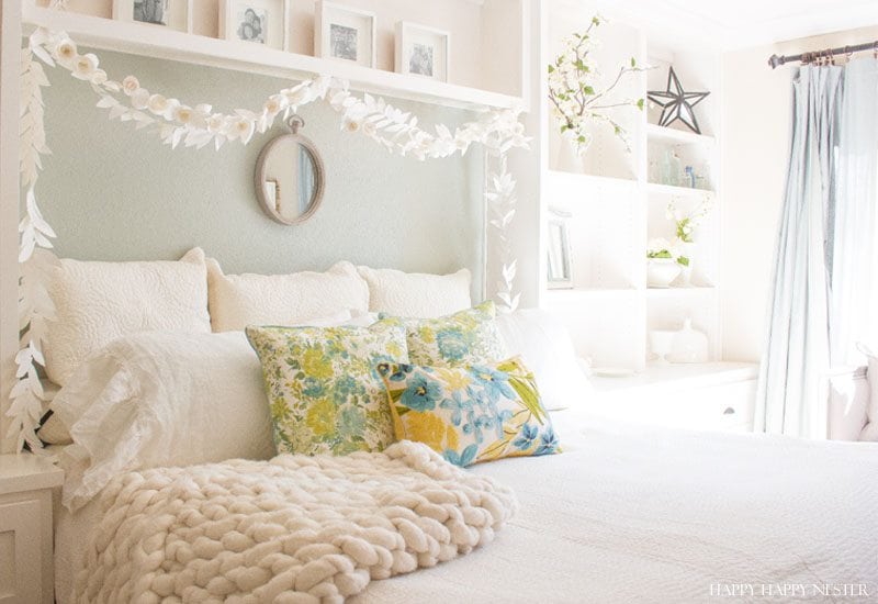 https://happyhappynester.com/wp-content/uploads/2018/02/bedroom-with-paper-garland.jpg