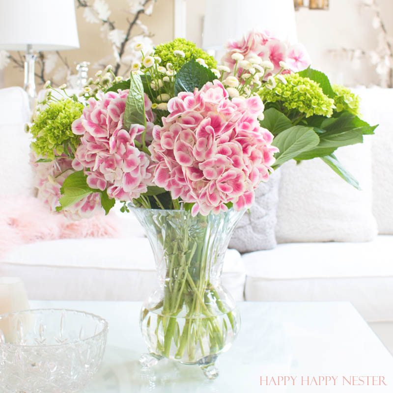 Decorating with pink is easy. Pink is getting a new look, and you should add some splashes in your home. I have two versions that introduce spring into my living room. I have some easy tips on quickly adding a few accents to your decor. Diy | decorating | blush | pink | millennials | trends