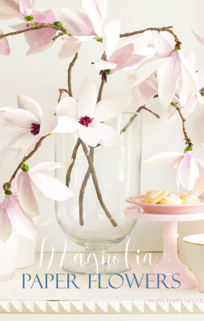 A magnolia paper flower tutorial you won't want to miss. I made this flower out of watercolor flower petals and added them to a tree branch, and you have lifelike flowers that you can make from paper. #DIY | #paperflowers | #crafts | #fauxflowers