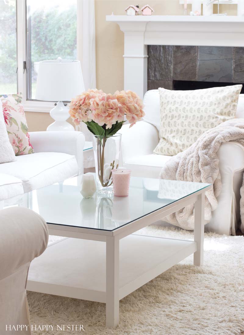 Decorating with pink is easy. Pink is getting a new look, and you should add some splashes in your home. I have two versions that introduce spring into my living room. I have some easy tips on quickly adding a few accents to your decor. Diy | decorating | blush | pink | millennials | trends