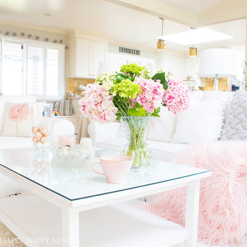 Decorating with pink is easy. Pink is getting a new look, and you should add some splashes in your home. I have two versions that introduce spring into my living room. I have some easy tips on quickly adding a few accents to your decor. Diy | decorating | blush | pink | millennials | trends