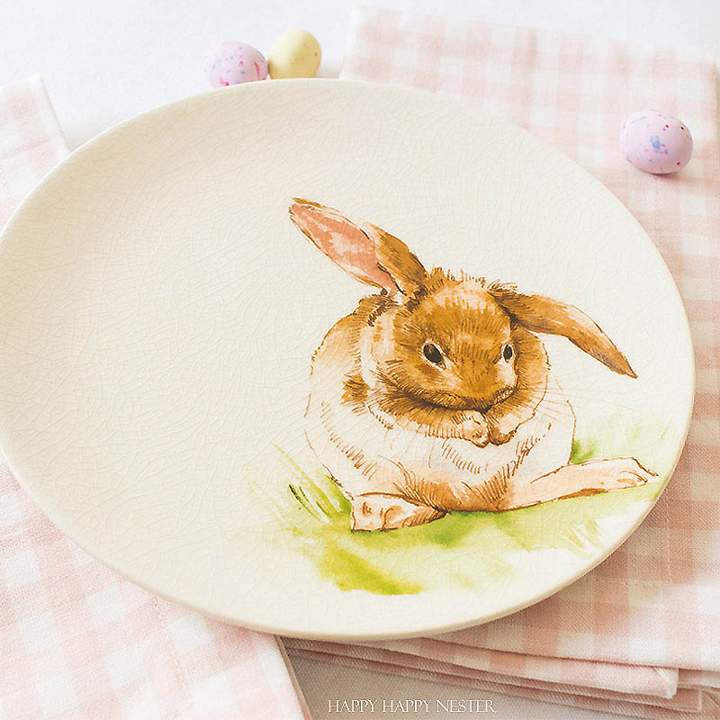 I'm all for simple Easter table settings. I'm certain you'll take away some inspiration from my table. Easy decorating ideas are among our Easter blog hop of twelve bloggers. Collect some ideas and get busy on your creating your Easter table. #decor #easter #easterdecor #decorating #eastertable #easytabledecor #holiday