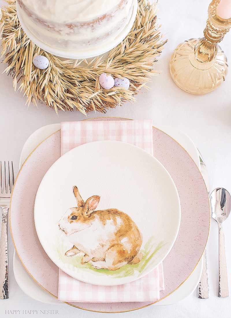 I'm all for simple Easter table settings. I'm certain you'll take away some inspiration from my table. Easy decorating ideas are among our Easter blog hop of twelve bloggers. Collect some ideas and get busy on your creating your Easter table. #decor #easter #easterdecor #decorating #eastertable #easytabledecor #holiday