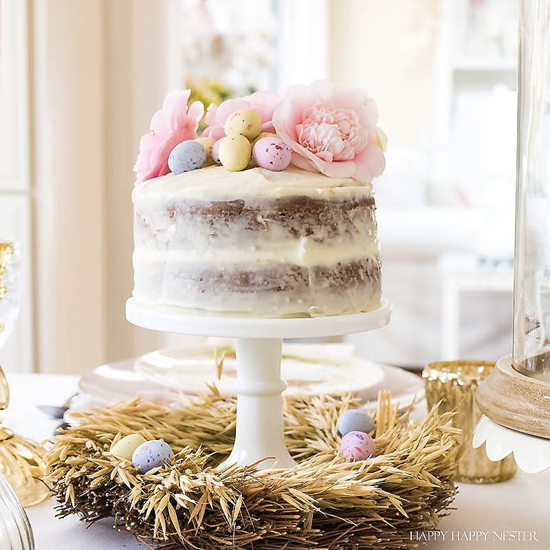 I'm all for simple Easter table settings. I'm certain you'll take away some inspiration from my table. Easy decorating ideas are among our Easter blog hop of twelve bloggers. Collect some ideas and get busy on your creating your Easter table. #decor #easter #easterdecor #decorating #eastertable #easytabledecor #holiday