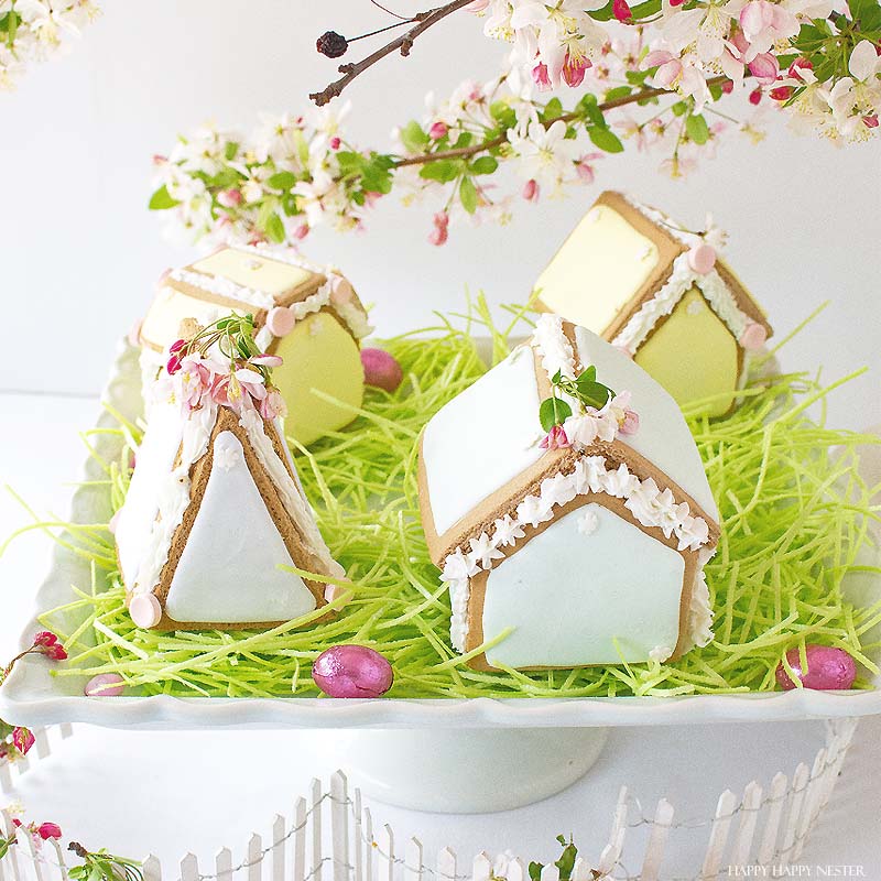 These adorable Easter Houses are perfect for spring. Make them from the mini-gingerbread kit, and you'll love this easy project. Place them on a cake stand and use them on your Easter or Spring table. Decorate them with icing and fun candies. You and your family will love this project. #spring #easter #diy #crafts