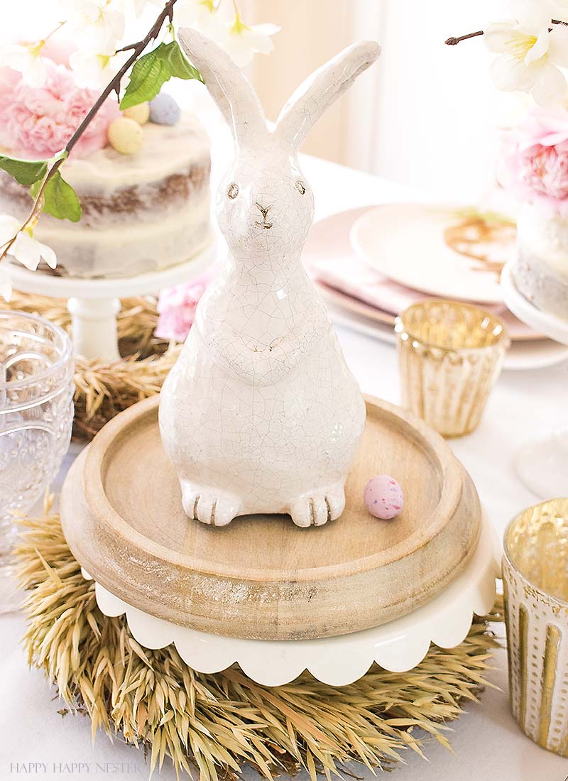 I'm all for simple Easter table settings. I'm certain you'll take away some inspiration from my table. Easy decorating ideas are among our Easter blog hop of twelve bloggers. Collect some ideas and get busy on your creating your Easter table. #decor #easter #easterdecor #decorating #eastertable #easytabledecor #holiday