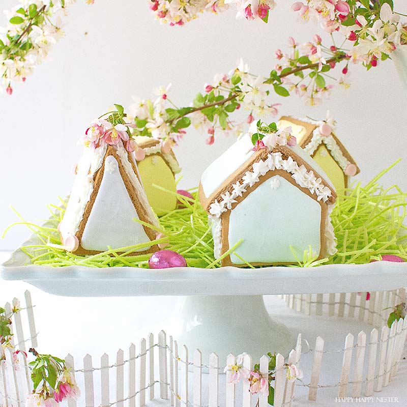 These adorable Easter Houses are perfect for spring. Make them from the mini-gingerbread kit, and you'll love this easy project. Place them on a cake stand and use them on your Easter or Spring table. Decorate them with icing and fun candies. You and your family will love this project. #spring #easter #diy #crafts