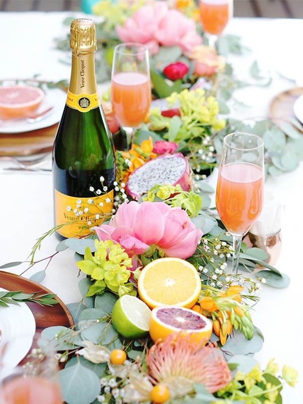 Citrus with flowers make the best wedding table