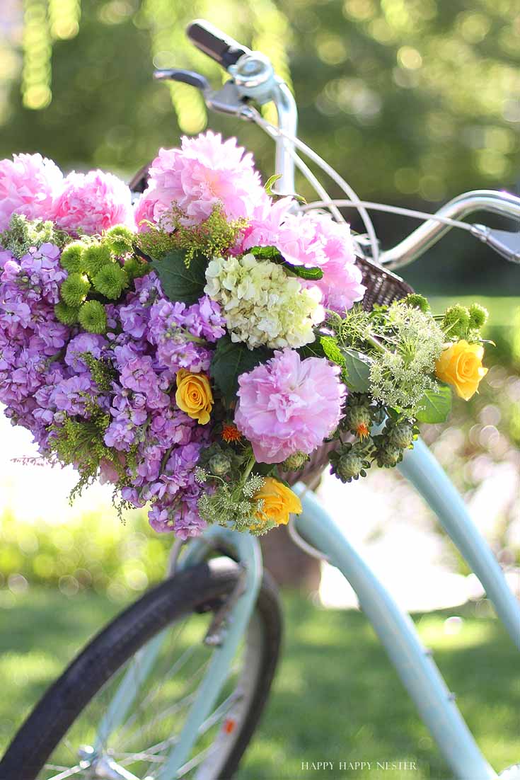 floral bouquet in a bike basket
