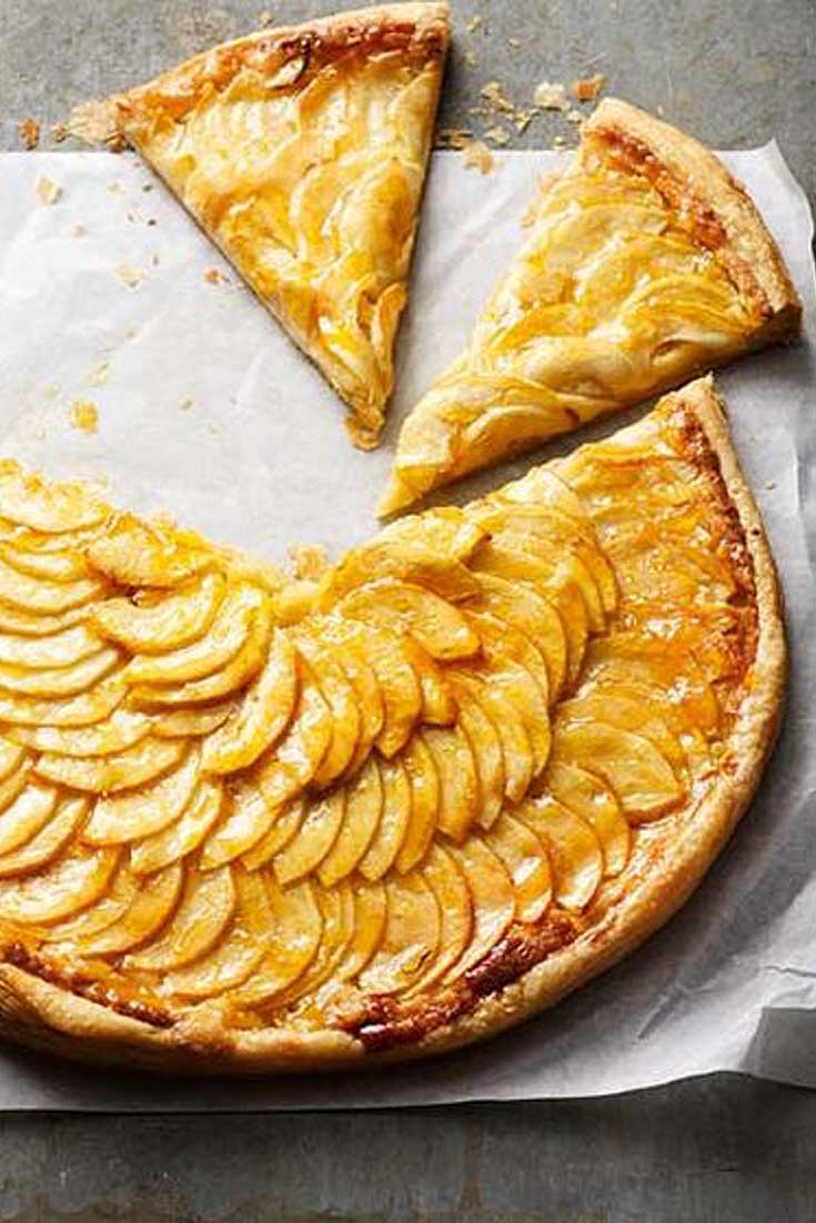 apple tart and slices on wax paper