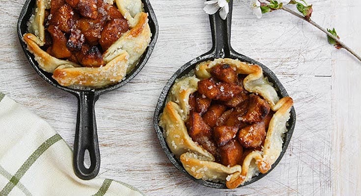 mini apple tarts in cast iron pans