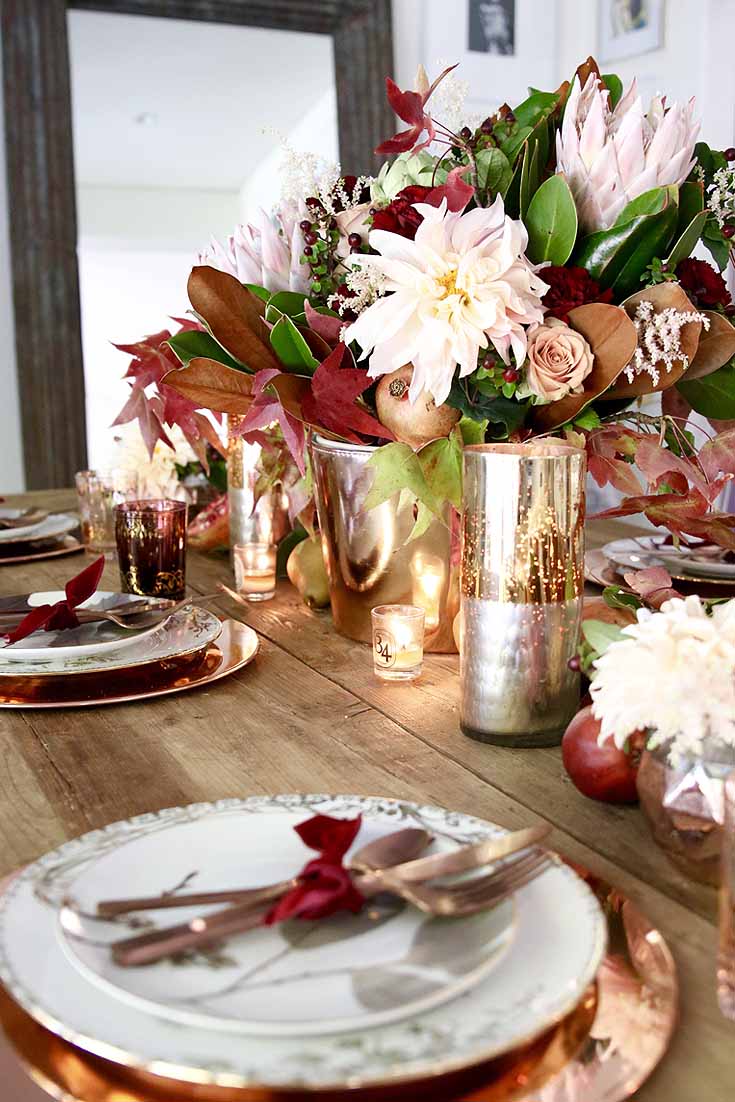 gold and blush fall decor on a fall table.