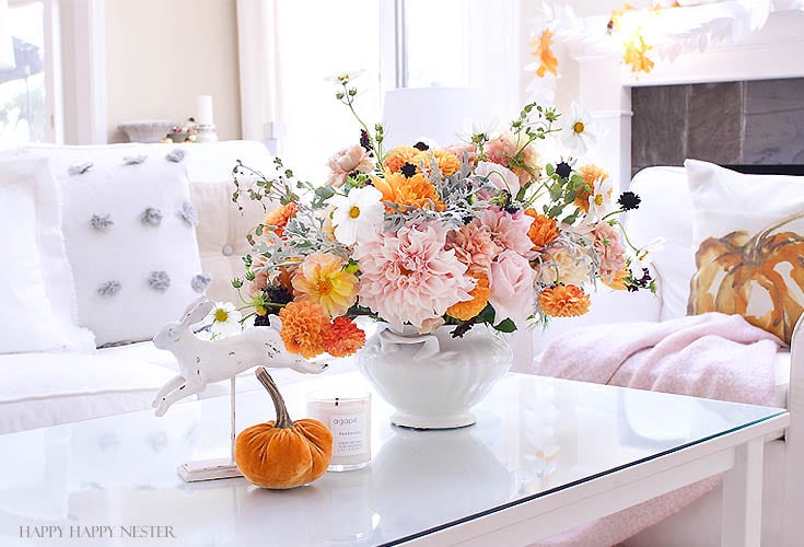 bouquet of fresh flowers on a white table in a white living room