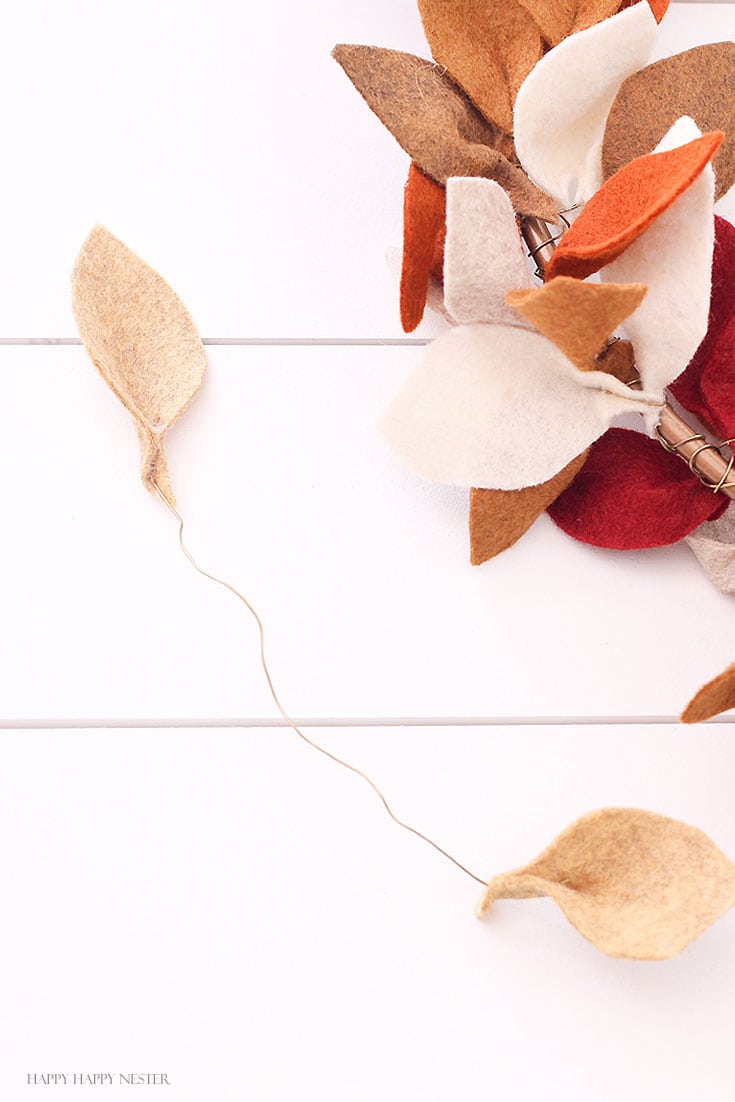 tan leaves attached to a wire