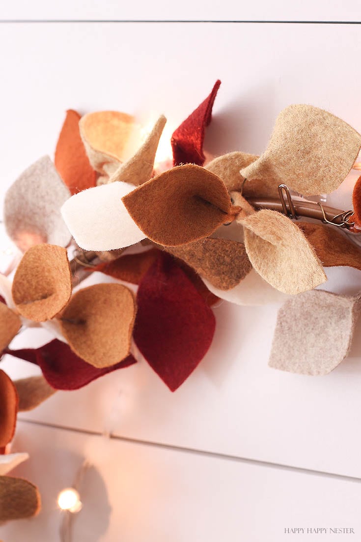 close up of felt leaves on hoop wreath