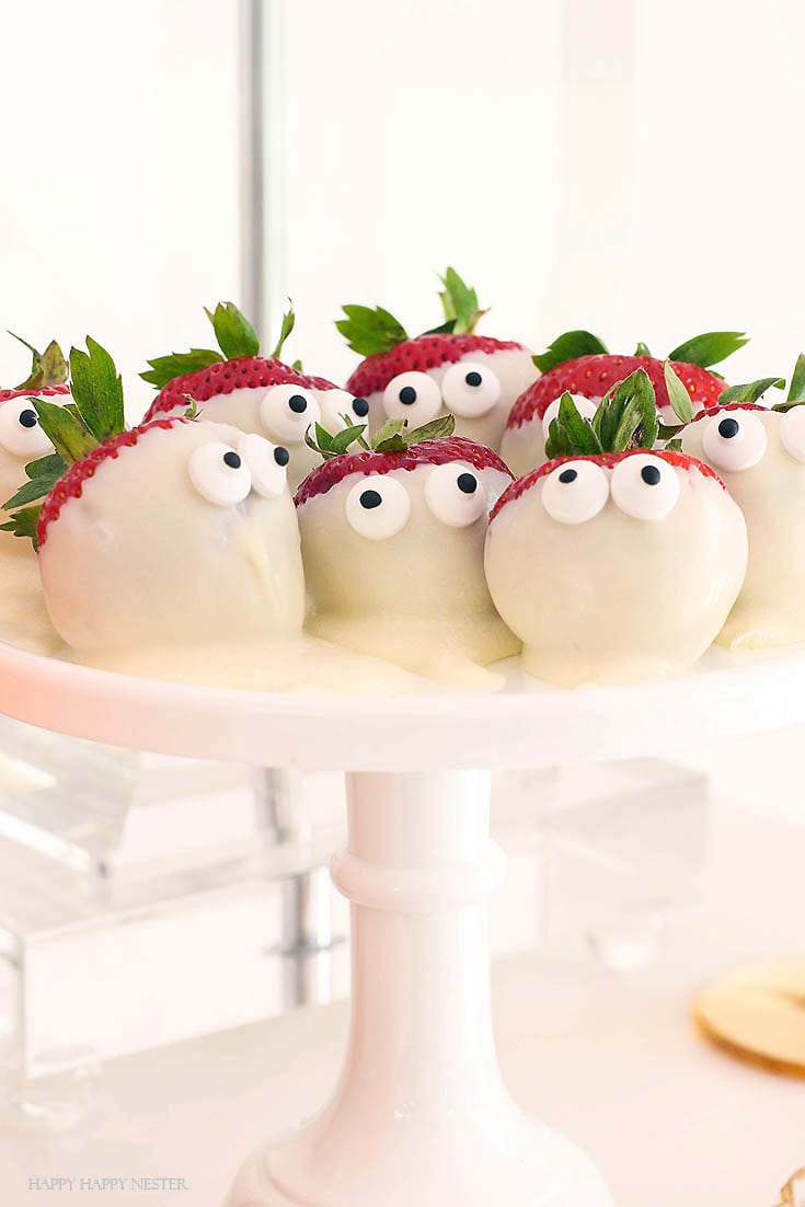 strawberries covered in white chocolate and two eyes