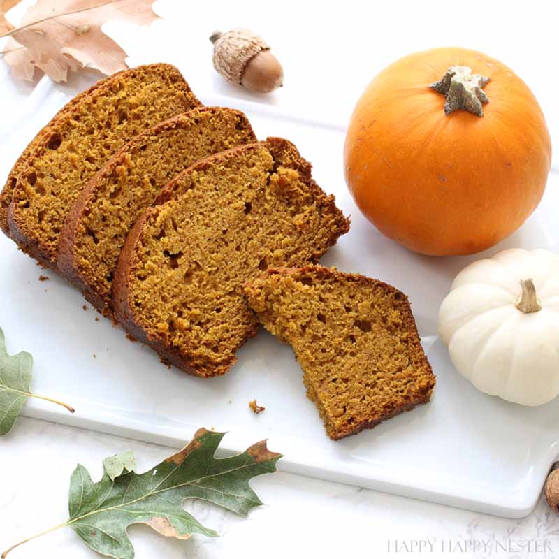 pumpkin recipe roundup with pumpkin bread on a white platter