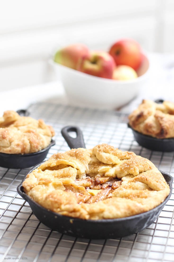 mini apple tart with custard in cast iron pans