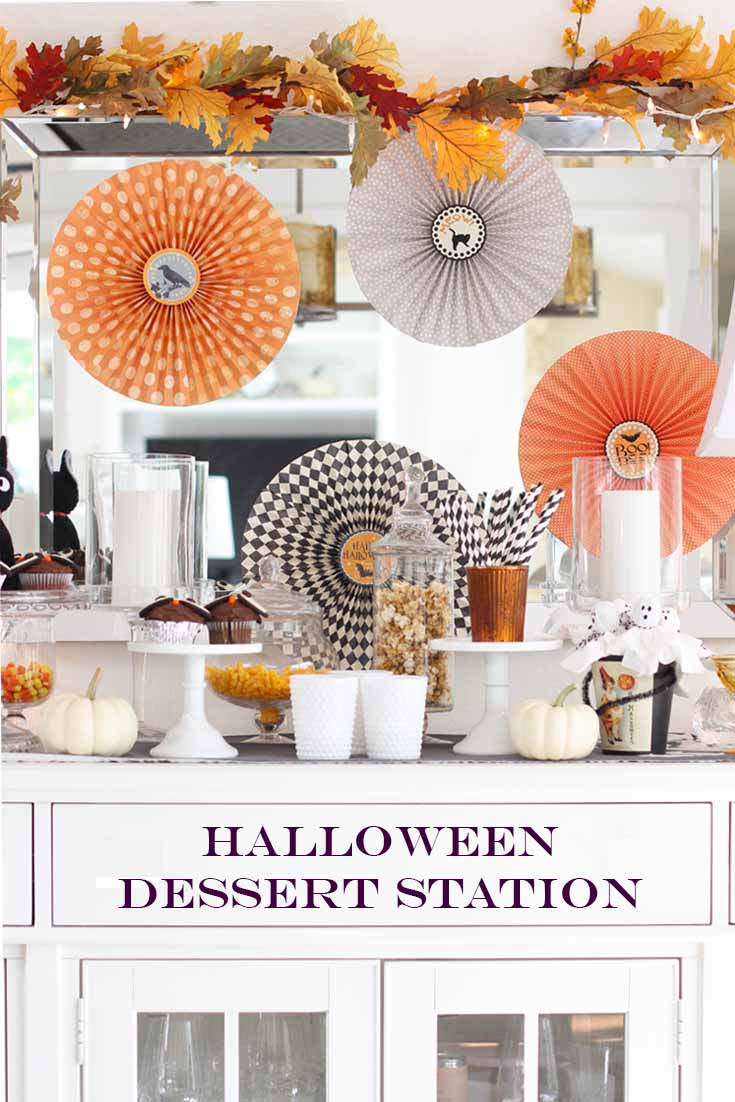 Picture of a Halloween dessert station with a graphic. This is a pin image