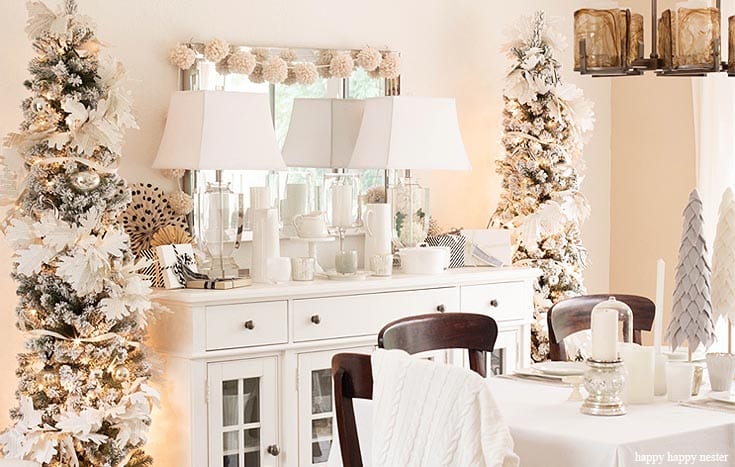 You don't want to miss out on this round-up of Christmas table decor. These styles range from winter white to vintage pink table decor. Lots of Christmas table ideas. #christmastable #christmasdecorating #holidaydecorating