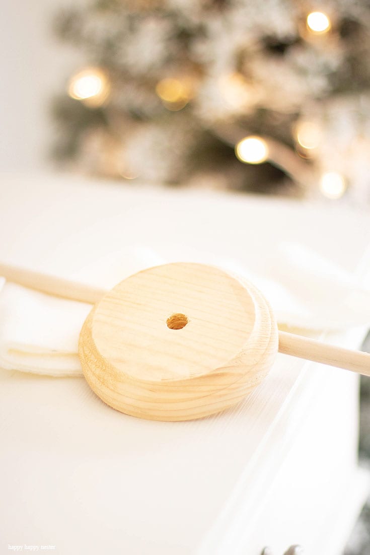 use a wooden dowel and base for a fleece christmas tree