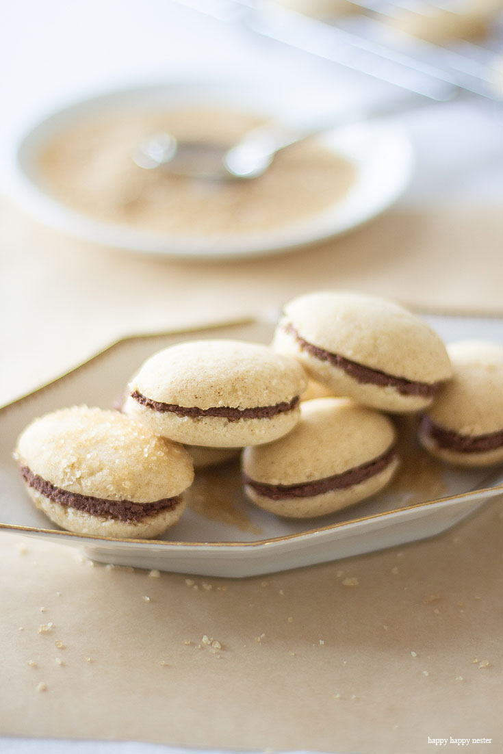 Brown Butter Sugar Cookies with Chocolate Ganache are rich with a light taste and luscious chocolate. This gourmet cookie will become a favorite on your first bite. Brown butter adds a nice rich and nutty flavor. Baking | Cookie | Sugar Cookie | Recipes | Desserts | Brown Butter | Best Cookie | Gourmet Cookies | Recipe