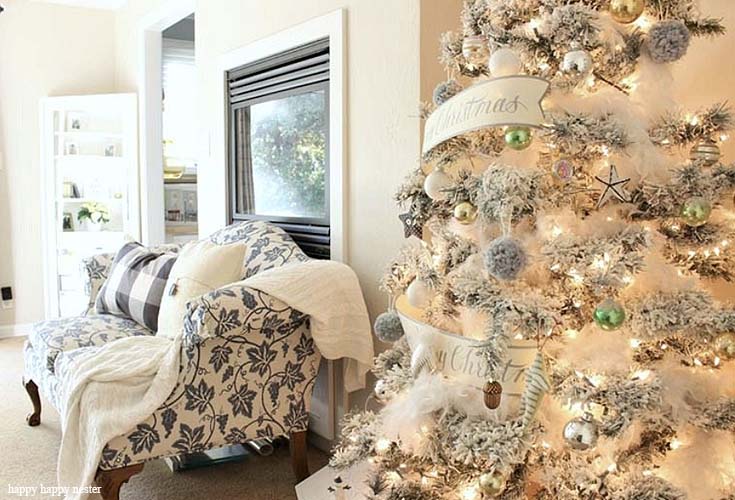 Here are 9 Simple Ways to Add Holiday Cheer to a Bedroom. In this tutorial, I show how easy it is to add holiday decor to a bedroom to make it ready for a guest or just family. Candles, poinsettias, twinkle lights, and pillows to name a few. Decorating | Holidays | Christmas | Christmas Decor | Holiday Bedroom Decor
