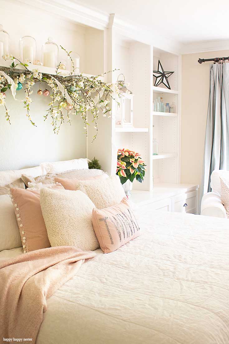 9 Simple Ways to Add Holiday Cheer to a Bedroom Here are 9 Simple Ways to Add Holiday Cheer to a Bedroom. In this tutorial, I show how easy it is to add holiday decor to a bedroom to make it ready for a guest or just family. Candles, poinsettias, twinkle lights, and pillows to name a few. Decorating | Holidays | Christmas | Christmas Decor | Holiday Bedroom Decor