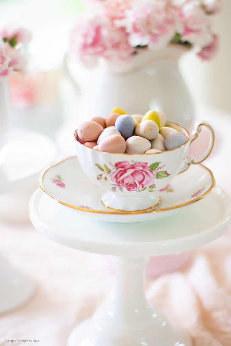 Use cake stands as candy holders. Cake stands are easy ways to decorate a table or your home. I have gathered some Cute Ways to Use a Cake Stand that I'm sure you'll love. You can use them for the holidays or even a wedding reception. They add drama and interest because of their styles and heights. #cakestands #decorating #weddings #flowers #decor