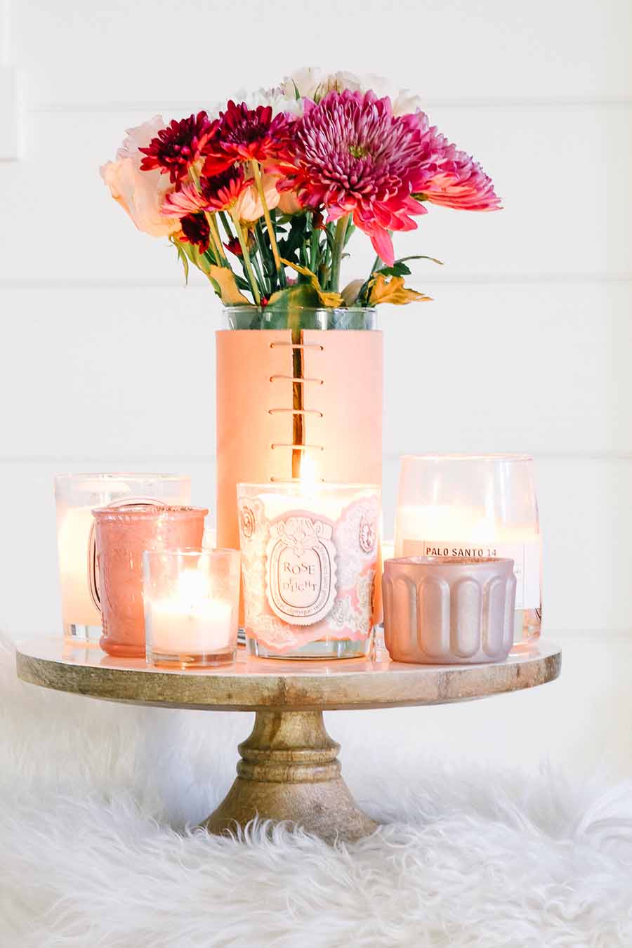 Candles on cake stands are the best way to display them. Cake stands are easy ways to decorate a table or your home. I have gathered some Cute Ways to Use a Cake Stand that I'm sure you'll love. You can use them for the holidays or even a wedding reception. They add drama and interest because of their styles and heights. #cakestands #decorating #weddings #flowers #decor