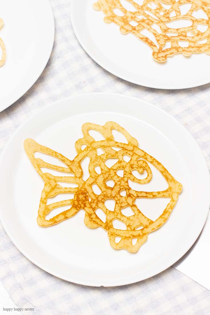 Kids can make these fun shaped pancakes. These are seriously the easiest Heart-Shaped Pancakes to make. And if you need some ideas for a Valentine's Day breakfast try making them. Inspired by the lace pancakes on The Great British Baking Show I made them. Not only are they cute, but they also taste yummy. Valentine's Day | Heart Pancakes | Lace Pancakes