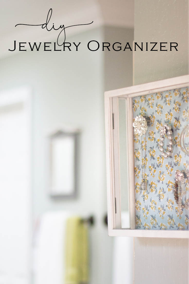 This Magnetic Hanging Jewelry Organizer DIY is the perfect way to display your jewelry and organize it as well. It is a magnetic board that you can place either fabric or paper on it and then make moveable magnetics that holds your jewelry in place. Crafts | Jewelry Holder | Organizing | Jewelry | Magnetic Board