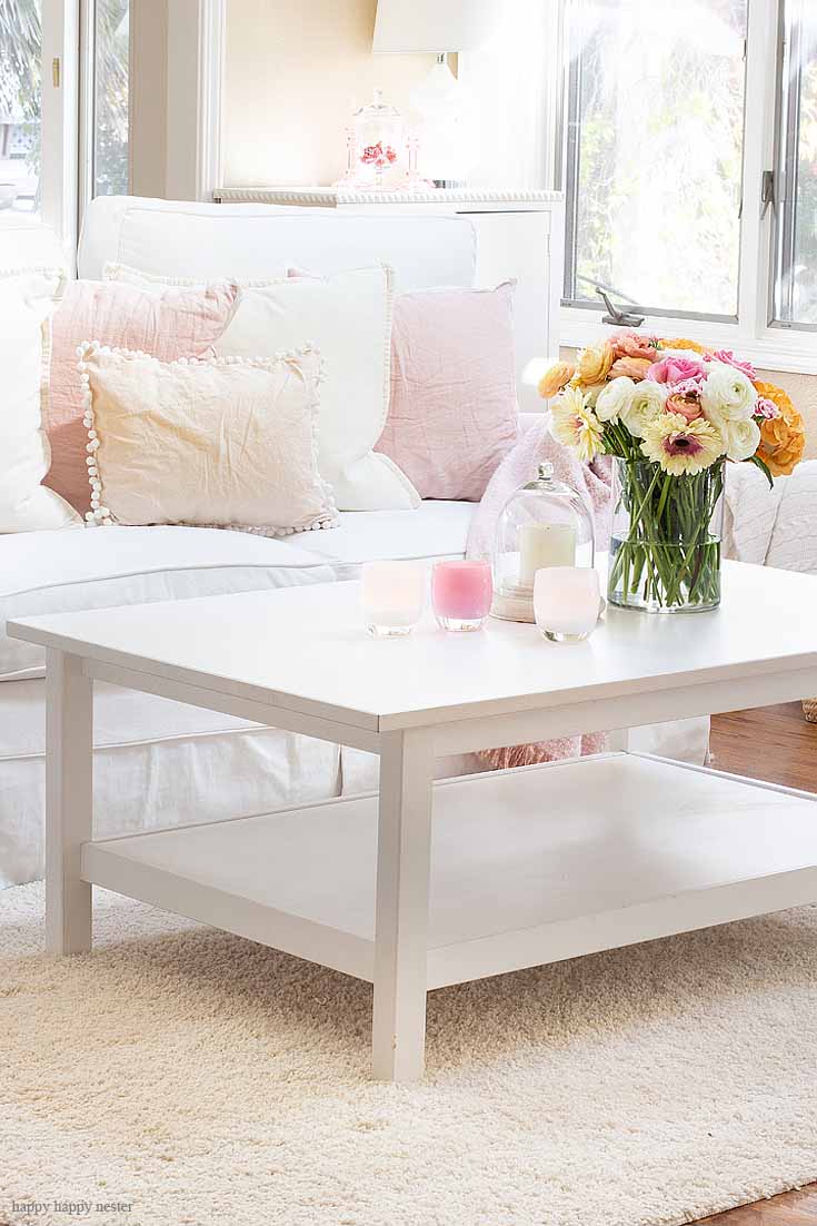 Get a new spring style with this fun home tour. The best way to say goodbye to winter is a Pretty Pink Spring Home Tour. I love how happy the color pink is, and it is so pretty in our living room, entry and dining room. Adding fresh flowers brightens a home and welcomes family and friends with a warm embrace. #decorating #springdecor #springtour #pinkdecor #hometour