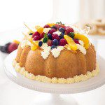 Here is a Yeast Cake Recipe that is soaked thoroughly in an Orange Grand Marnier syrup. This cake is topped with a Sabayon cream frosting and fresh fruit. This unique yeast cake is a bit rustic and very gourmet in taste. It is an impressive cake. Cake | French Cake | Baking | Gourmet Desserts | European Cake