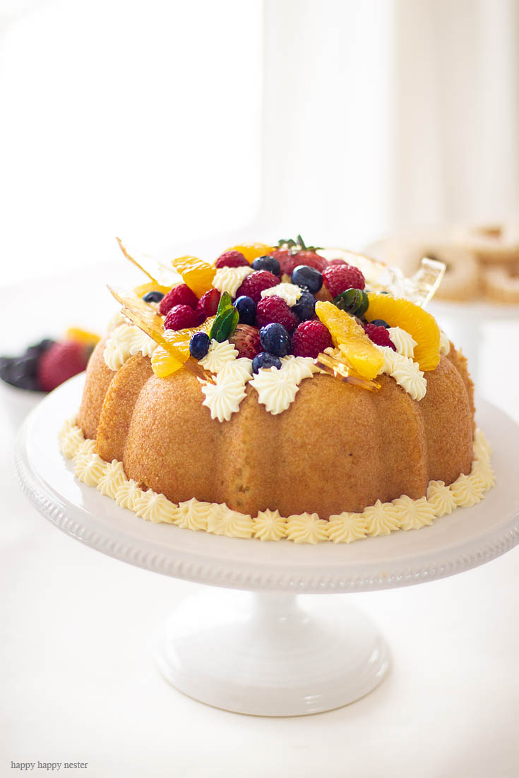 Here is a Yeast Cake Recipe that is soaked thoroughly in an Orange Grand Marnier syrup. This cake is topped with a Sabayon cream frosting and fresh fruit. This unique yeast cake is a bit rustic and very gourmet in taste. It is an impressive cake. Cake | French Cake | Baking | Gourmet Desserts | European Cake