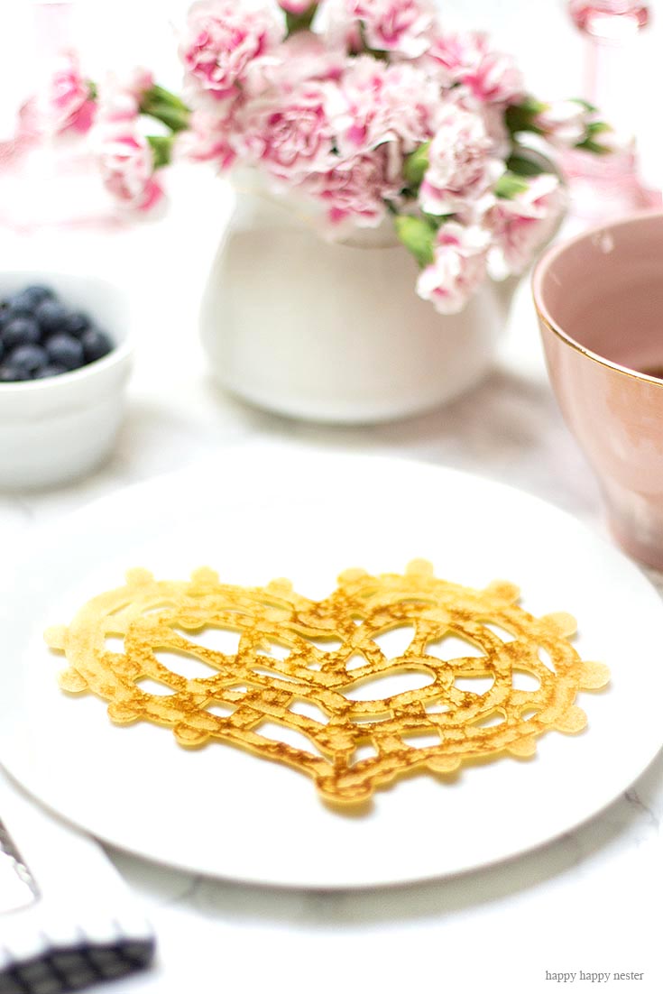 These are seriously the easiest Heart-Shaped Pancakes to make. And if you need some ideas for a Valentine's Day breakfast try making them. Inspired by the lace pancakes on The Great British Baking Show I made them. Not only are they cute, but they also taste yummy. Valentine's Day | Heart Pancakes | Lace Pancakes