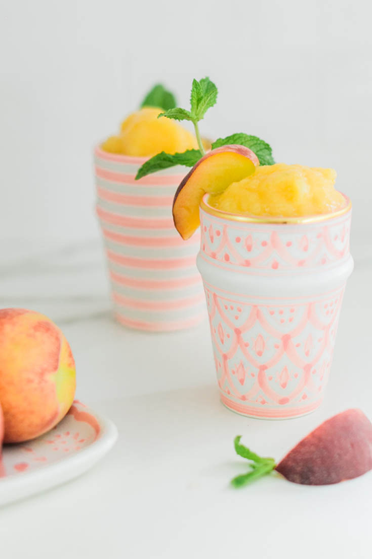 Peach Slush. Here are 10 Non-Alcohol Summer Drinks that you'll love. Need some recipes this summer, well, we have you covered if you need slushies, teas, fruit drinks and more. These bloggers have tested them, and these are their favorites. #drinks #summerdrinks #cocktail #drinkrecipes #recipes #happyhour #weddings #weddingdrinks