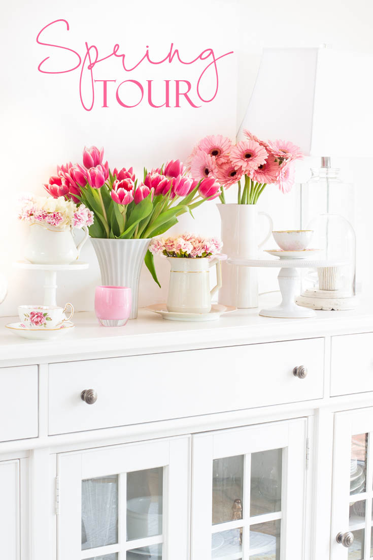 The best way to say goodbye to winter is a Pretty Pink Spring Home Tour. I love how happy the color pink is, and it is so pretty in our living room, entry and dining room. Adding fresh flowers brightens a home and welcomes family and friends with a warm embrace. #decorating #springdecor #springtour #pinkdecor #hometour