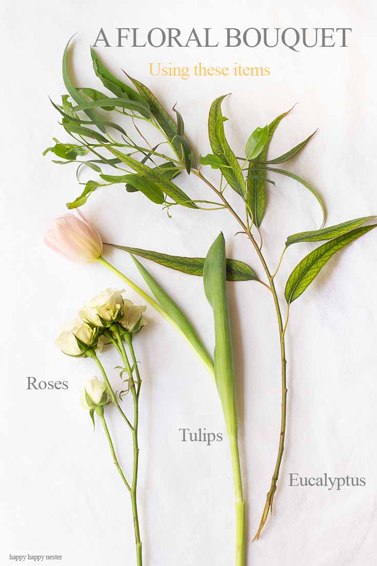 Create this flower arrangement using tulips, roses, and eucalyptus! Here is an easy way to Create a Gorgeous Mother's Day Floral Bouquet used just three types of flowers and greenery. These flowers are all at your local grocery store. This flower tutorial explains all the things you need to do in five easy steps. #flowers #flowerarrangements #bouquet #flowervase #mothersdayflowers