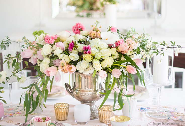 Don't be afraid to use a fun container for a flower vase! Here is an easy way to Create a Gorgeous Mother's Day Floral Bouquet using just three types of flowers and greenery. These flowers are all at your local grocery store. This flower tutorial explains all the things you need to do in five easy steps. #flowers #flowerarrangements #bouquet #flowervase #mothersdayflowers