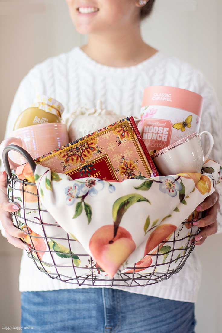 Learn how to create this beautiful tea basket. Need some Gift Basket Ideas for Mother's Day? Or for that matter any friend who loves tea parties? Well, this post teaches all the things to consider when putting together a great gift basket from the container to the perfect items from HomeGoods! #giftbasketideas #giftbaskets #gifts #HomeGoods #shopbaskets #teabasket