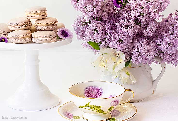 Need ideas on how to decorate your spring table? It doesn't take much to create a Beautiful Spring Table with Fresh Flowers. This spring table with fresh lilacs and other garden flowers is so easy to create. No need to spend much to style a fabulous spring table. #springtable #flowerbouquet #freshflowers #lilacs #lavendertable #decoratingwithlilacs #purplelilacs