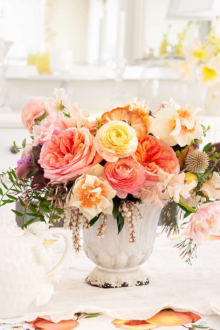 Add a vase of gorgeous flowers to dress up a table for tea. Need some Gift Basket Ideas for Mother's Day? Or for that matter any friend who loves tea parties? Well, this post teaches all the things to consider when putting together a great gift basket from the container to the perfect items from HomeGoods! #giftbasketideas #giftbaskets #gifts #HomeGoods #shopbaskets #teabasket
