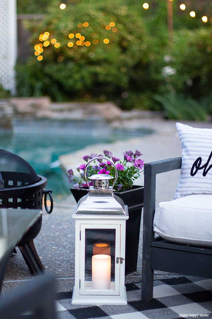 We love our outdoor fire pit for summer smores. In this post learn Learn How to Create a Cozy Outdoor Living Space in 9 easy tips. This DIY to summer decorating is essential. #summerdecor #outdoorlivingspaces #entertaining