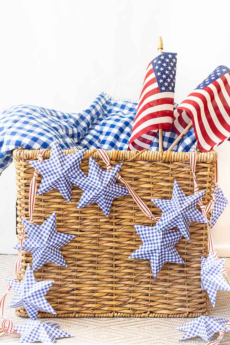This DIY Paper Stars for 4th of July Garland is an easy and inexpensive holiday banner. Get the free printable, cut and fold and string it on a cute ribbon. The blog post has an easy to follow video tutorial #4thofjuly #garland #crafts #papercrafts #summerproject #diy #paper