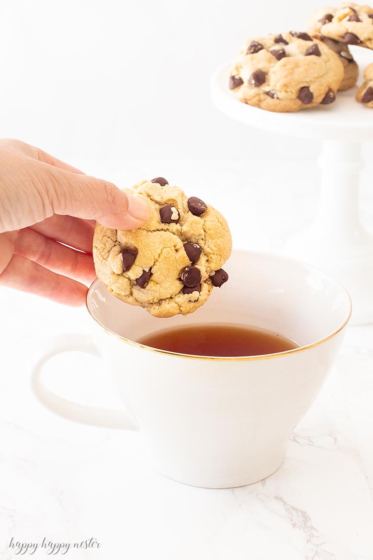 This delicious cookie is our longtime family favorite Chocolate Chip Cookie Recipe! This chocolate chip cookie will surprise you with its crunchy quality that is packed with loads of chocolate chips and nuts. I'm certain you have never had a chocolate chip cookie like this one! #cookie #chocolatecookie #baking #cookierecipe #bestcookie #bestchocolatechip